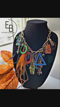 Load and play video in Gallery viewer, &quot;New Orleans&quot; Signature Junk Jewel Charm Necklace w/ Wood Charms
